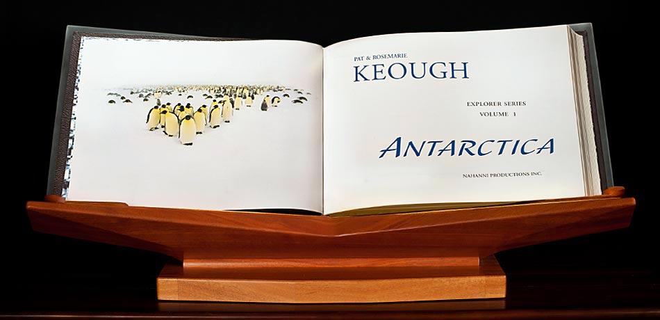 Title page of ANTARCTICA showing photo of Emperor Penguin in a Bizzard