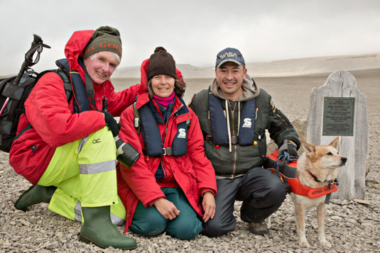 Pat and Rosemarie Keough with Pascal Lee, Planetary Scientist with the SETI Institute and NASA. And with King Kong, polar bear dog. Beechey Island, Franklin Graves.