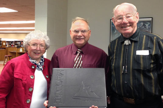 Jack and Phyllis Kalivoda with Dan Knock head librarian at Hillsdale College, Michigan, receiving donation of ANTARCTICA, the tome by Pat and Rosemarie Keough